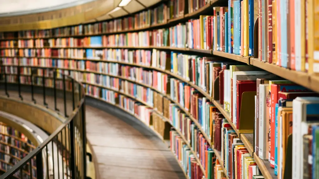 Curved shelves of books in a library